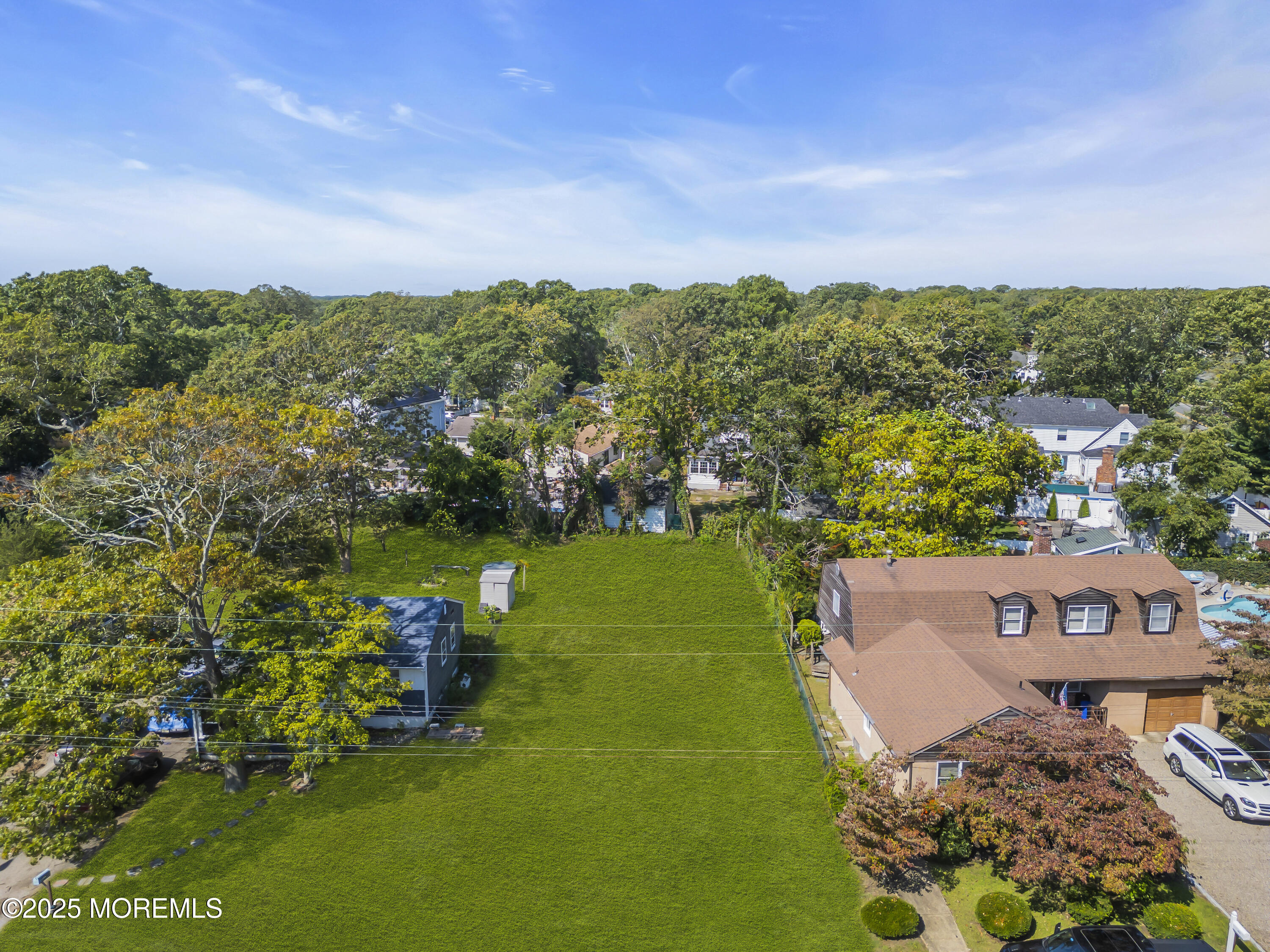 505 Curtis Avenue Point Pleasant, NJ 08742 - Photo 5 of 11 an aerial view of a house with a garden