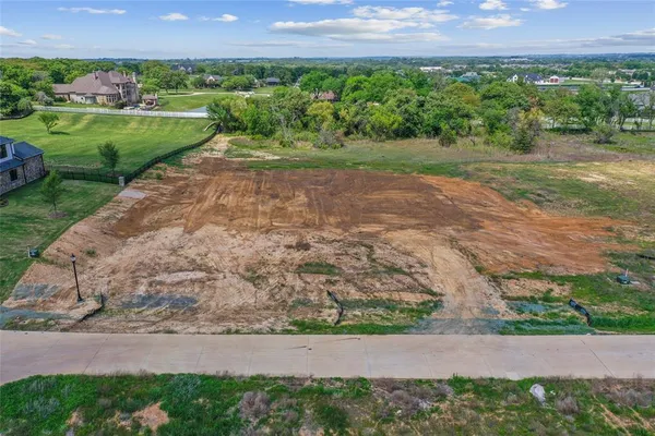 a view of a yard with a garden