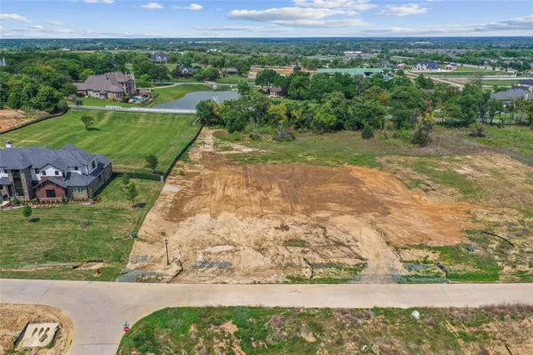 a view of a yard with a garden