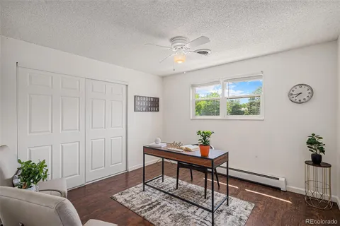 a workspace with furniture and window