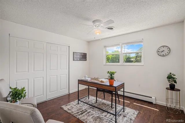 a workspace with furniture and window