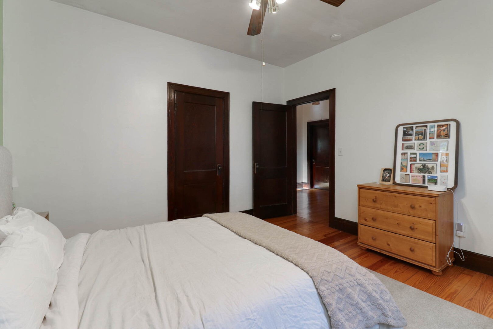 601 East Grove Street Bloomington, IL 61701 - Photo 18 of 42 a bedroom with a bed and a dresser