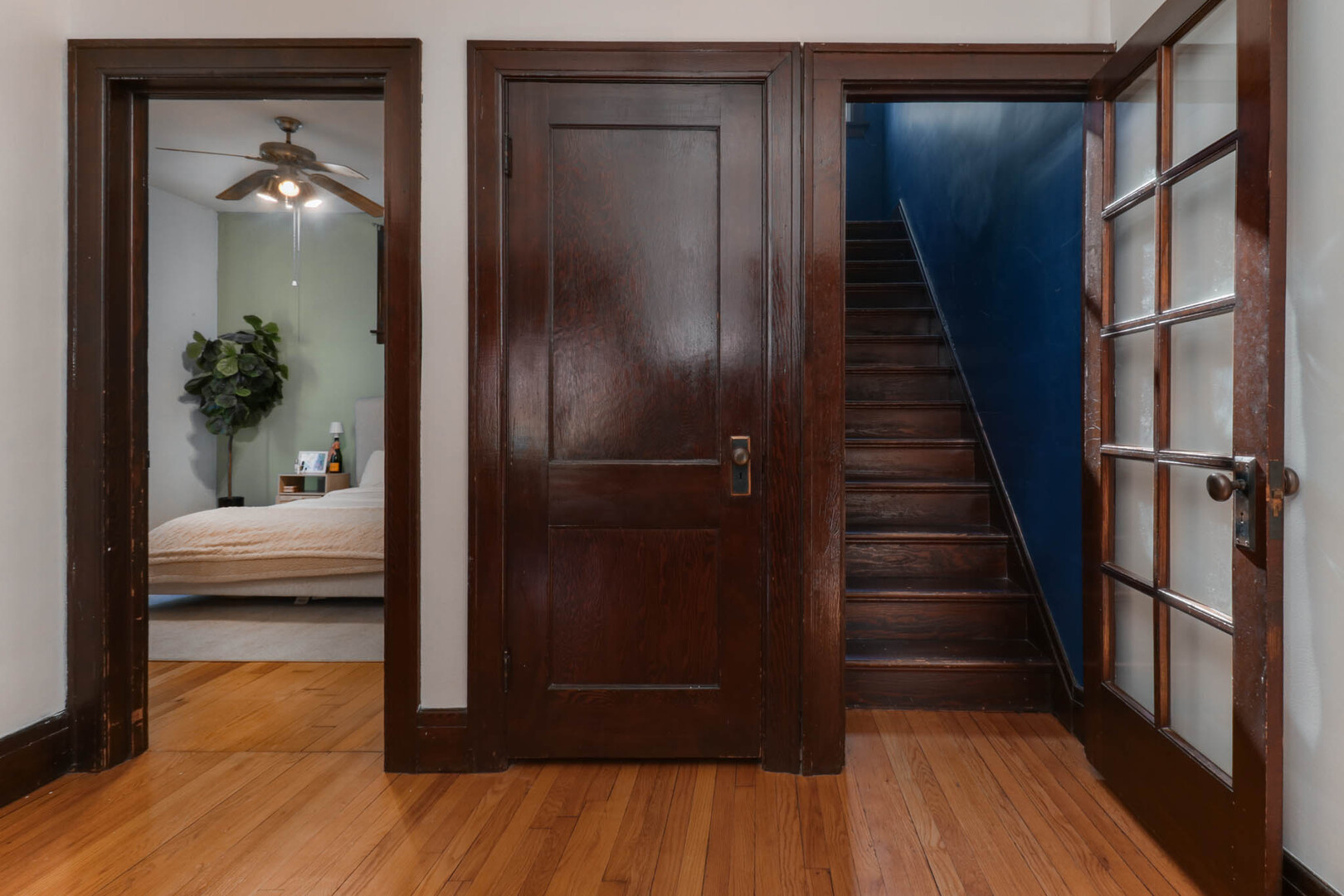 601 East Grove Street Bloomington, IL 61701 - Photo 20 of 42 a view of a hallway view with wooden floor and staircase