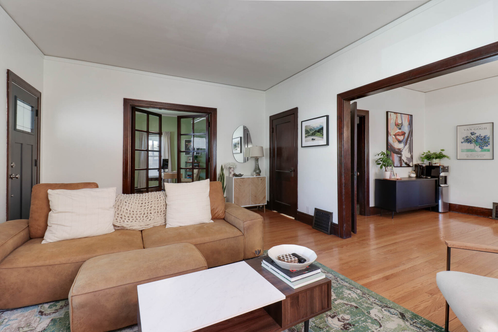 601 East Grove Street Bloomington, IL 61701 - Photo 2 of 42 a living room with furniture and a couch
