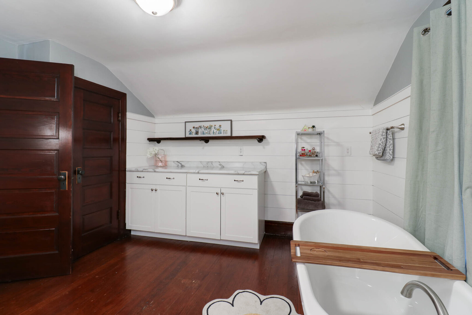 601 East Grove Street Bloomington, IL 61701 - Photo 23 of 42 a kitchen with a refrigerator sink and cabinets