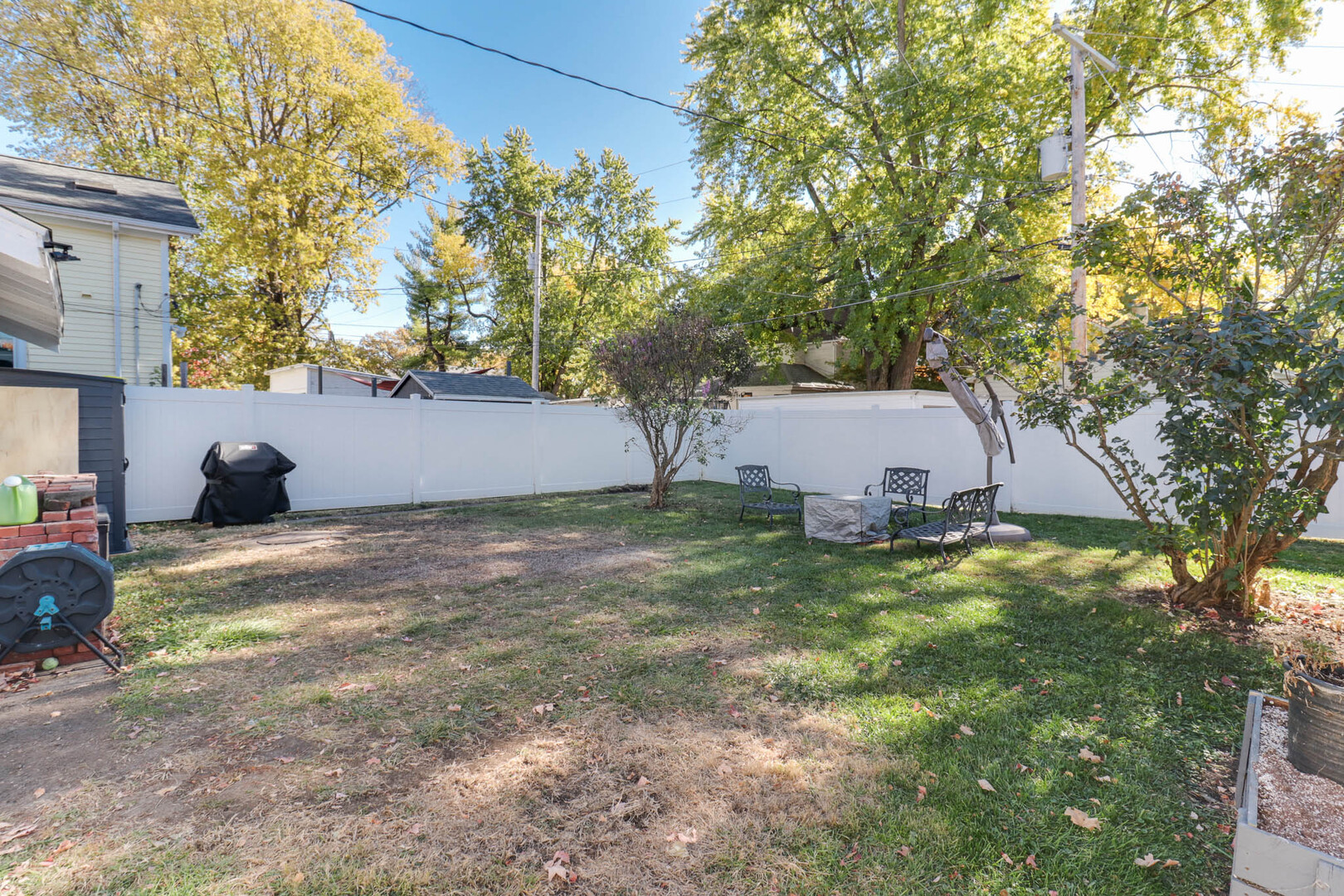 601 East Grove Street Bloomington, IL 61701 - Photo 39 of 42 a backyard of a house with lots of green space