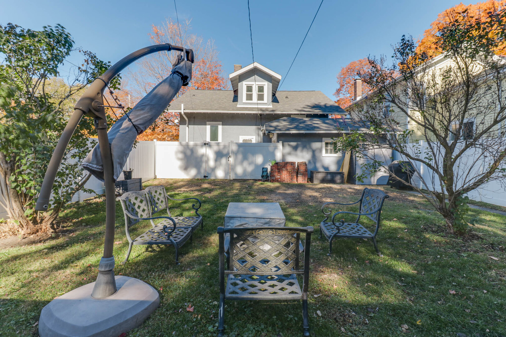 601 East Grove Street Bloomington, IL 61701 - Photo 40 of 42 a view of a chairs and table in backyard