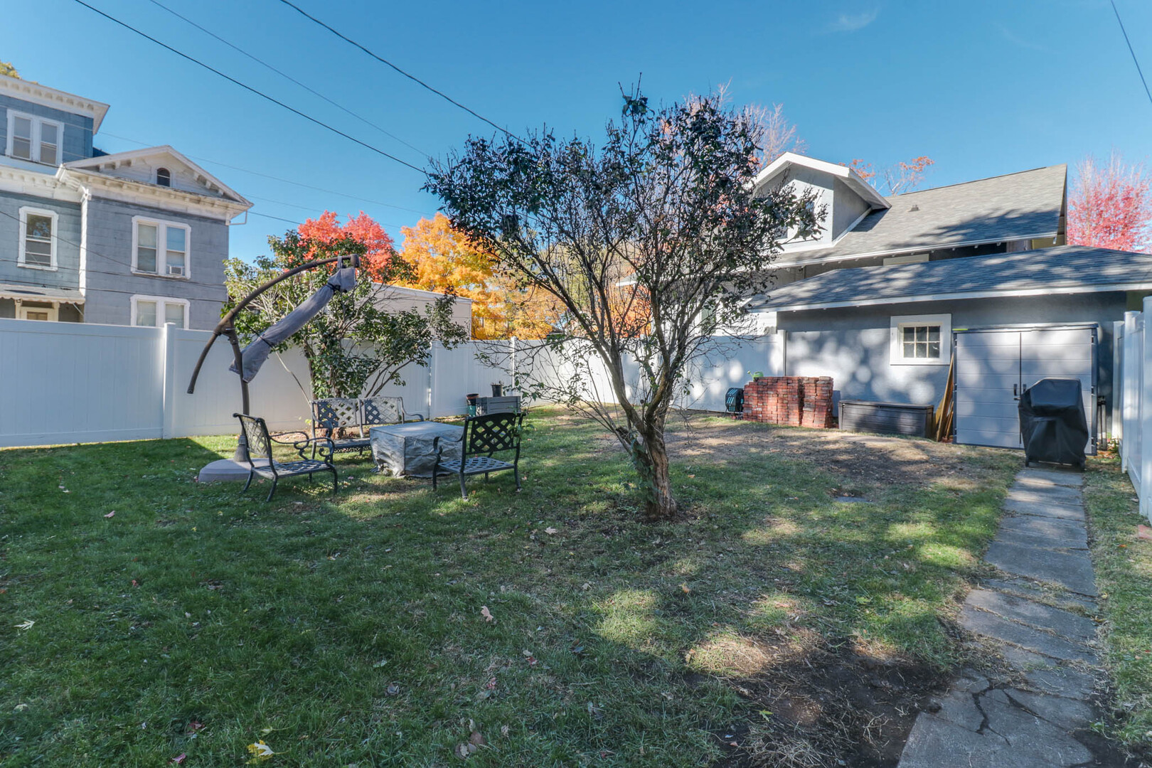 601 East Grove Street Bloomington, IL 61701 - Photo 5 of 42 a view of a house with a yard