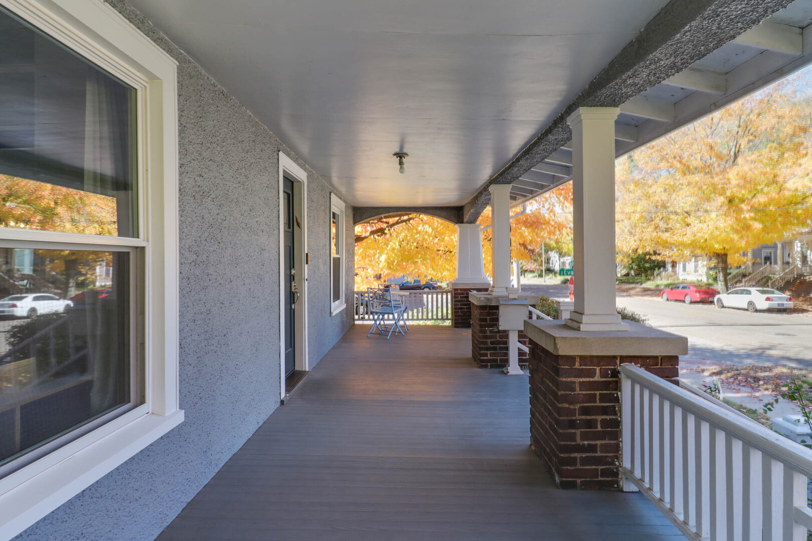 601 East Grove Street Bloomington, IL 61701 - Photo 7 of 42 a living room with furniture and a floor to ceiling window