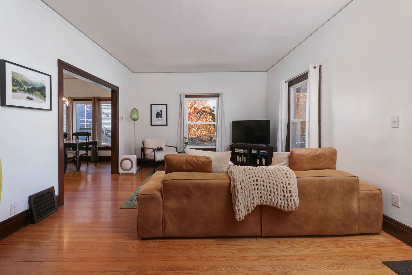 601 East Grove Street Bloomington, IL 61701 - Photo 9 of 42 a living room with furniture and a flat screen tv