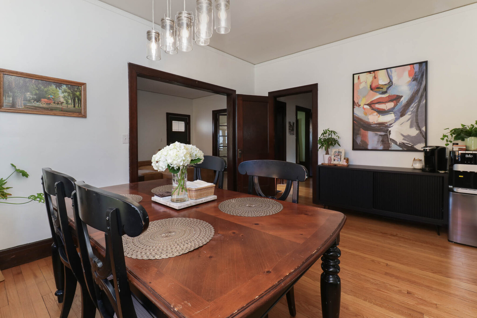 601 East Grove Street Bloomington, IL 61701 - Photo 10 of 42 a view of a dining room with furniture and wooden floor