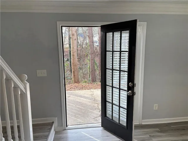 a view of a backyard of the house