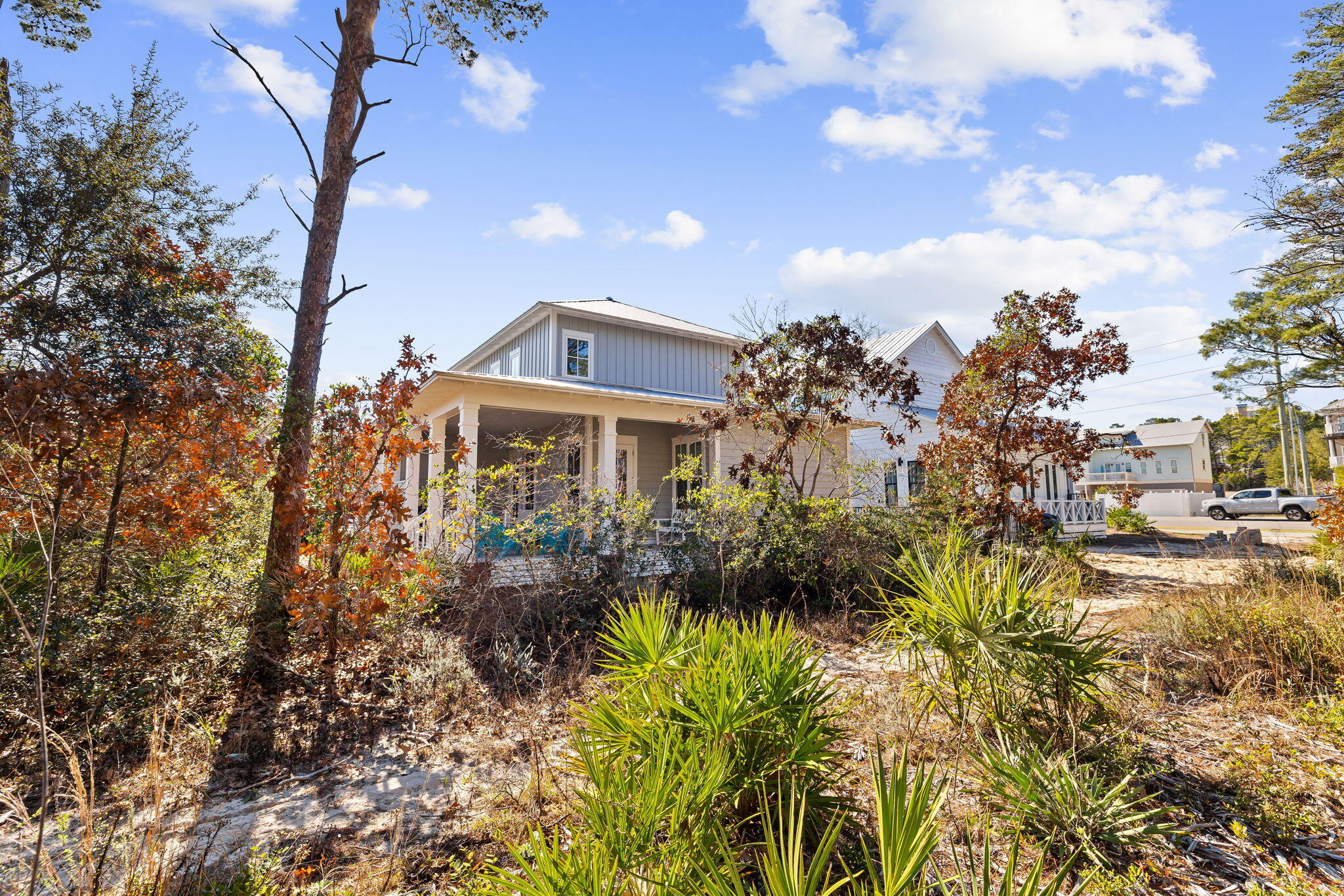 27 Matt's Way Santa Rosa Beach, FL 32459 - Photo 18 of 67 a view of a house with a yard and garden