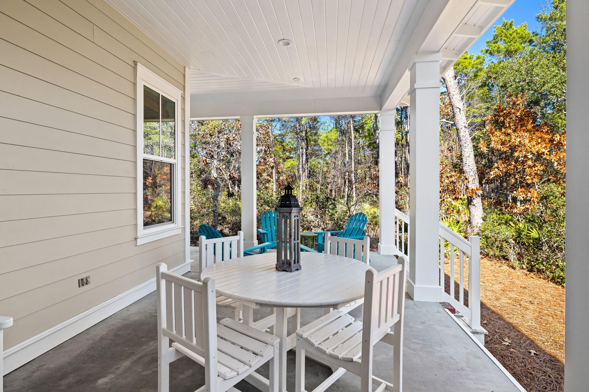 27 Matt's Way Santa Rosa Beach, FL 32459 - Photo 23 of 67 a view of an outdoor dining space with a table and chairs