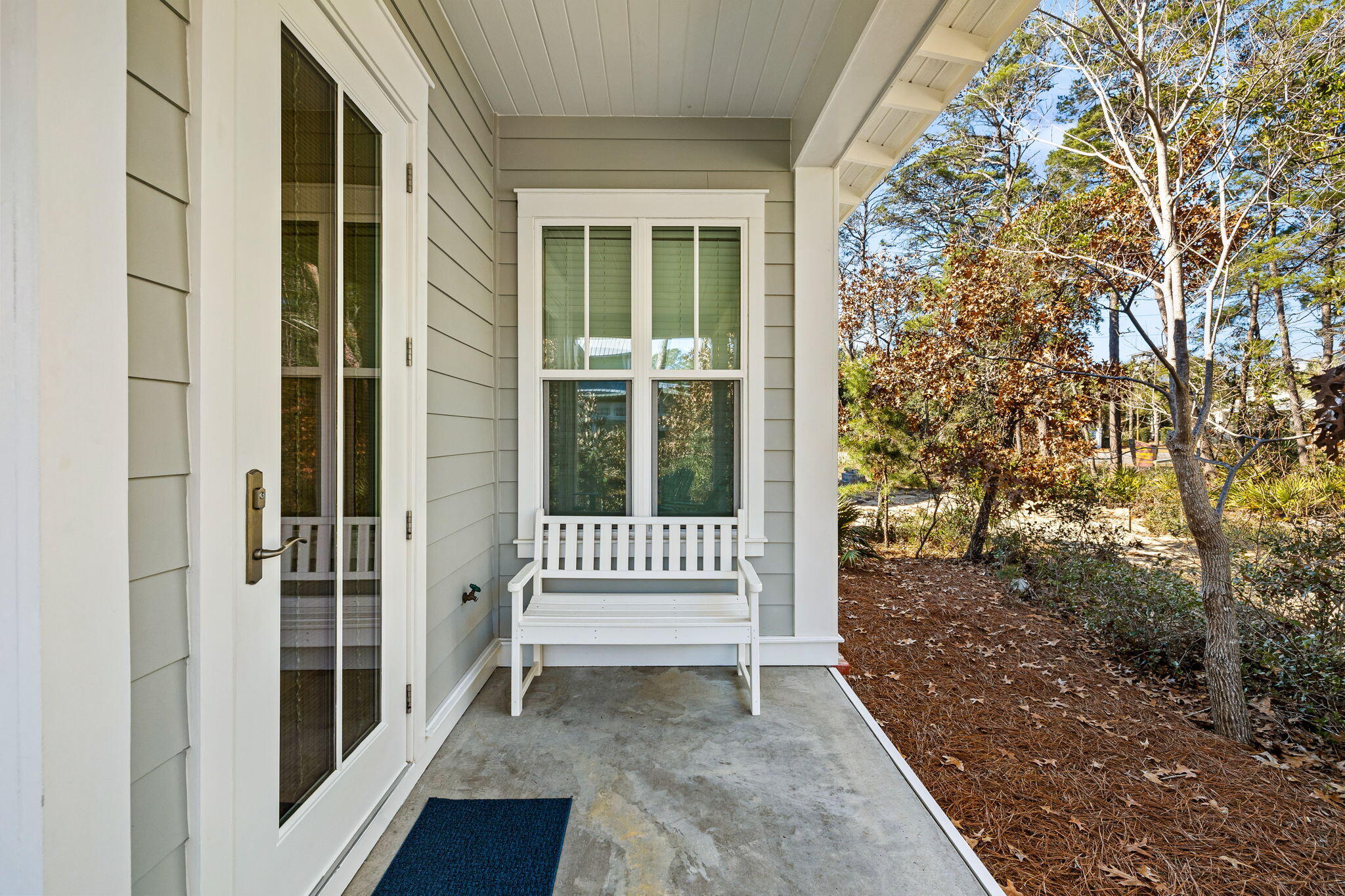 27 Matt's Way Santa Rosa Beach, FL 32459 - Photo 25 of 67 a view of a porch with a bench