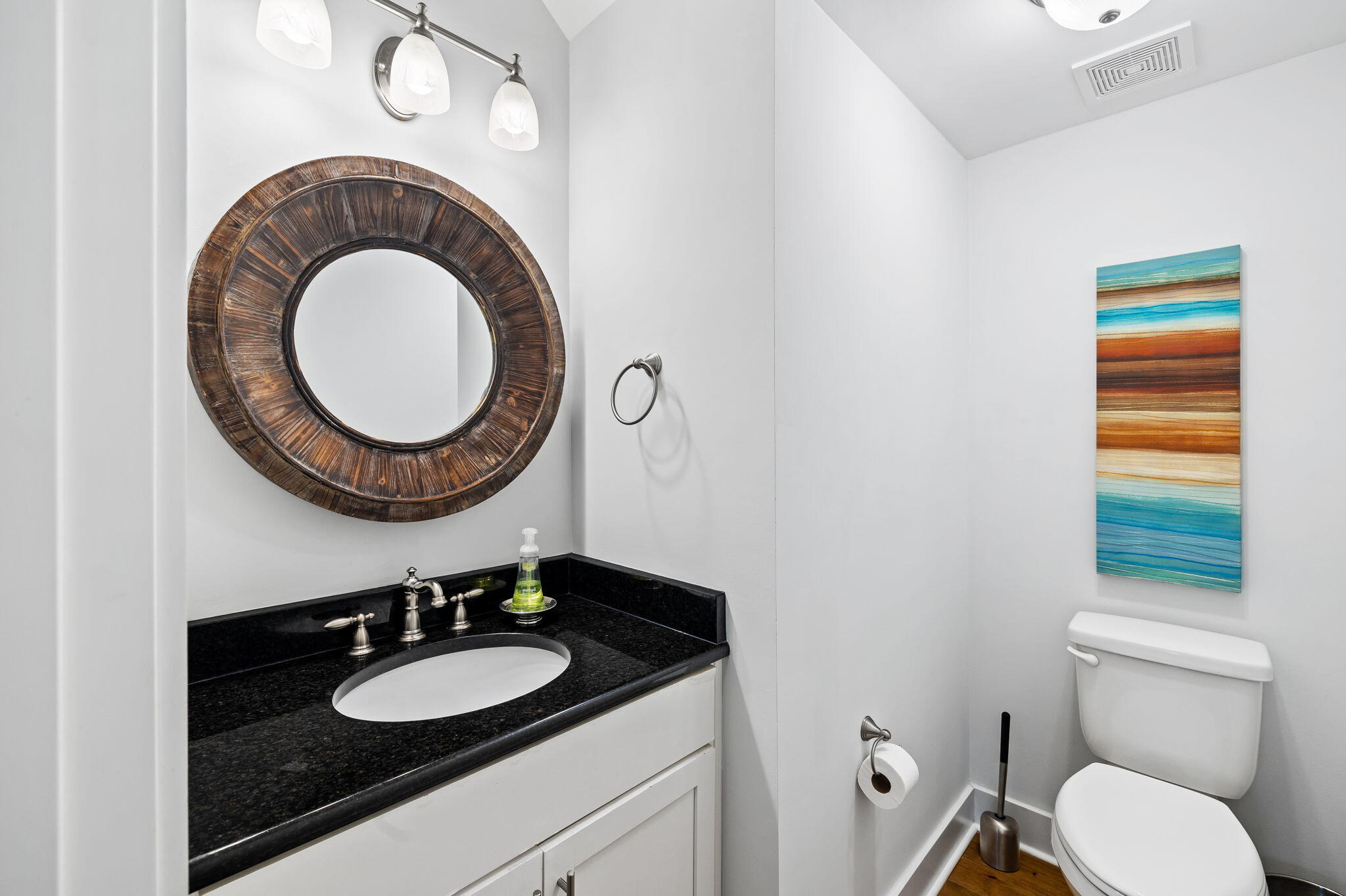 27 Matt's Way Santa Rosa Beach, FL 32459 - Photo 33 of 67 a bathroom with a sink and a mirror