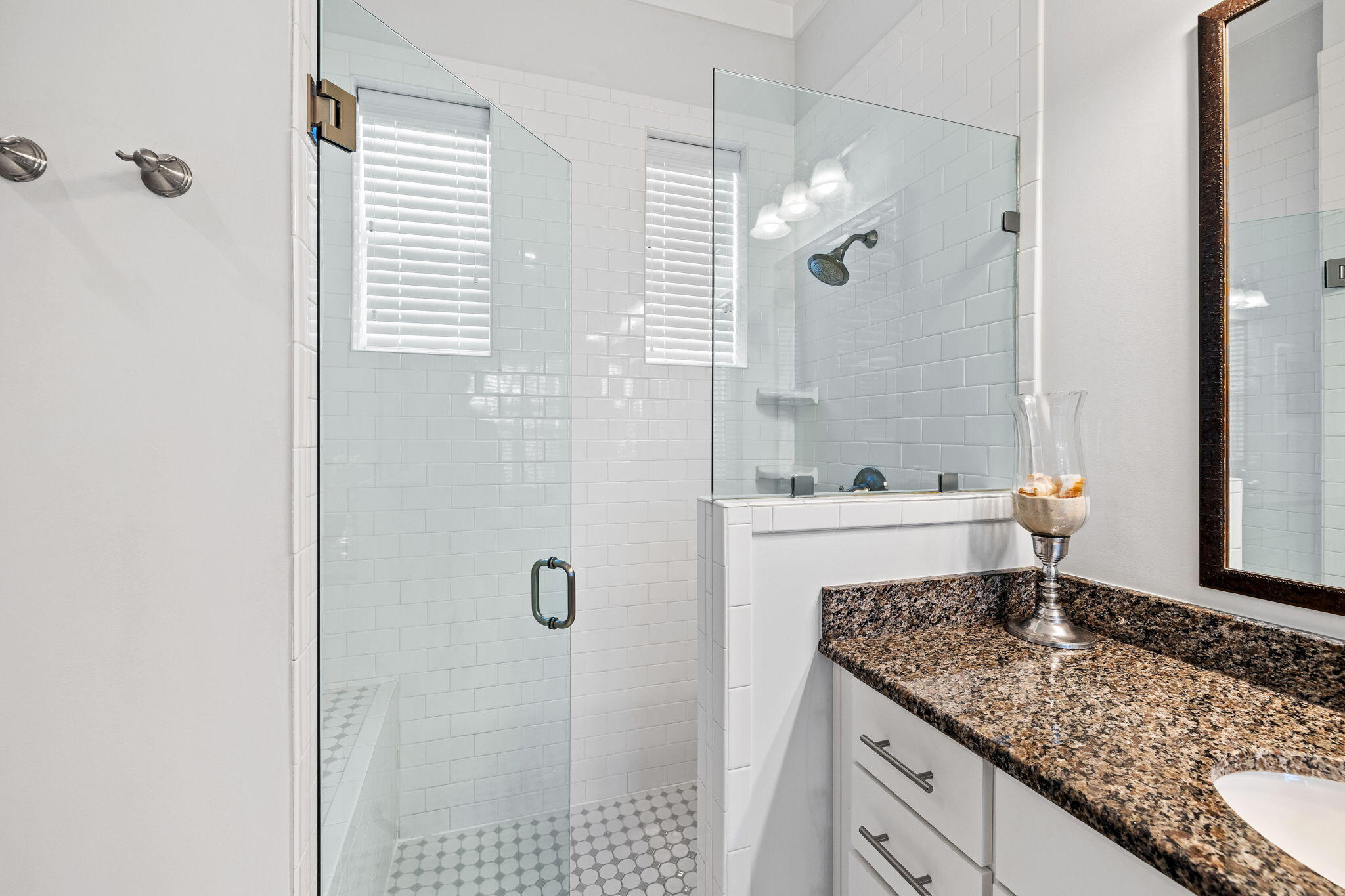 27 Matt's Way Santa Rosa Beach, FL 32459 - Photo 41 of 67 a bathroom with a granite countertop sink and a mirror