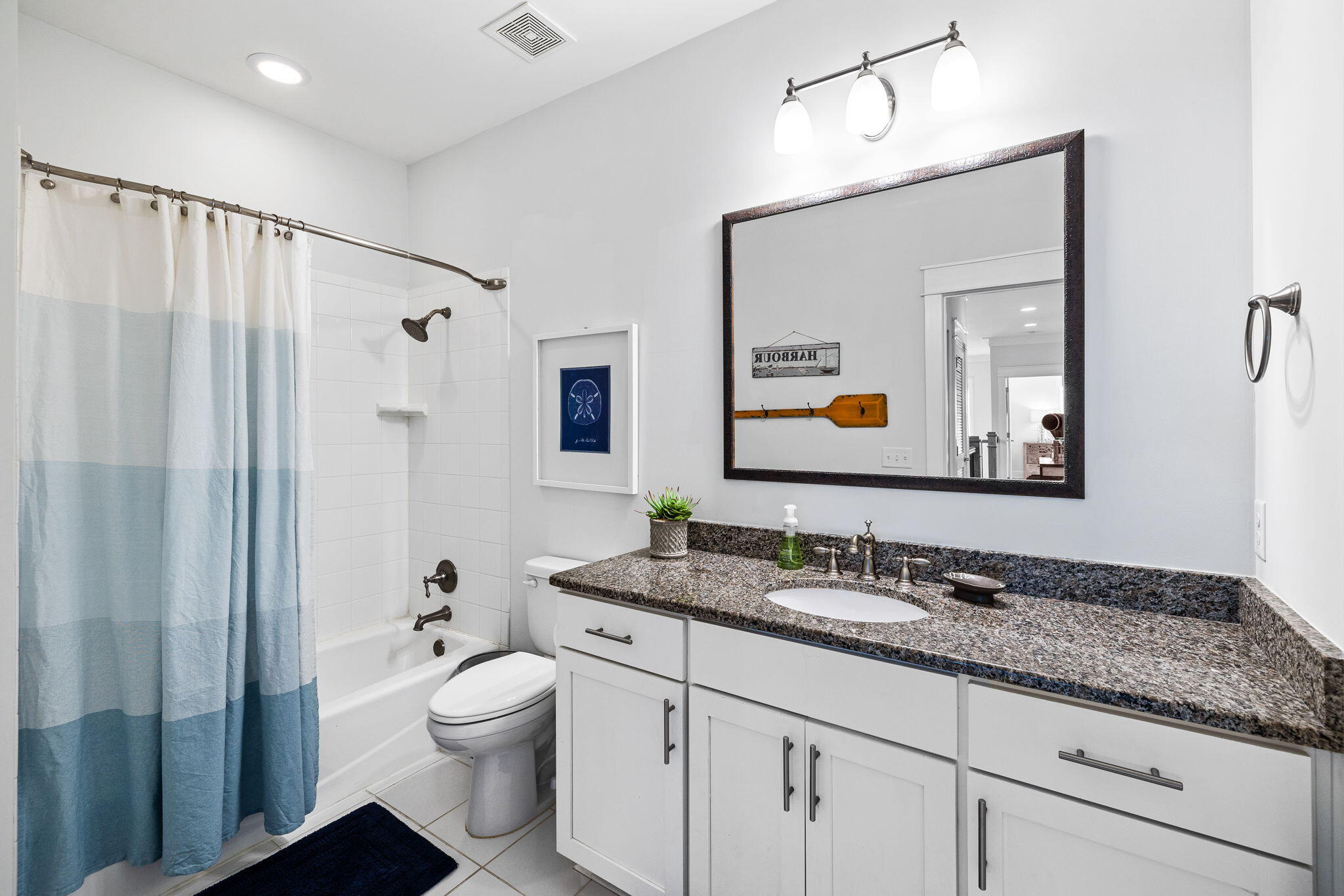 27 Matt's Way Santa Rosa Beach, FL 32459 - Photo 46 of 67 a bathroom with a granite countertop sink toilet and mirror