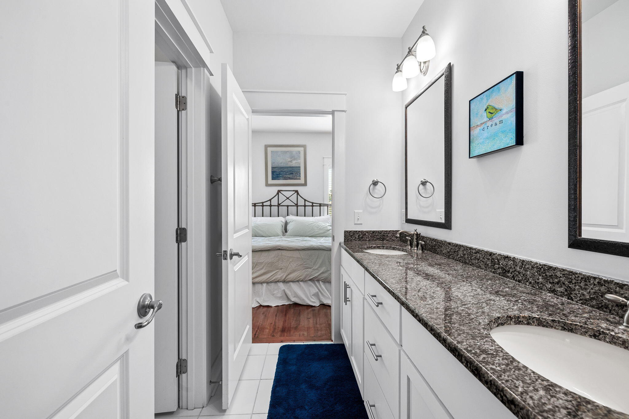 27 Matt's Way Santa Rosa Beach, FL 32459 - Photo 49 of 67 a bathroom with a granite countertop double vanity sink and mirror