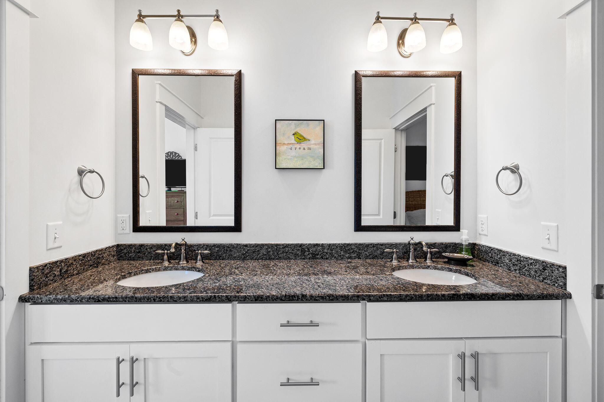 27 Matt's Way Santa Rosa Beach, FL 32459 - Photo 50 of 67 a bathroom with a granite countertop sink and a mirror