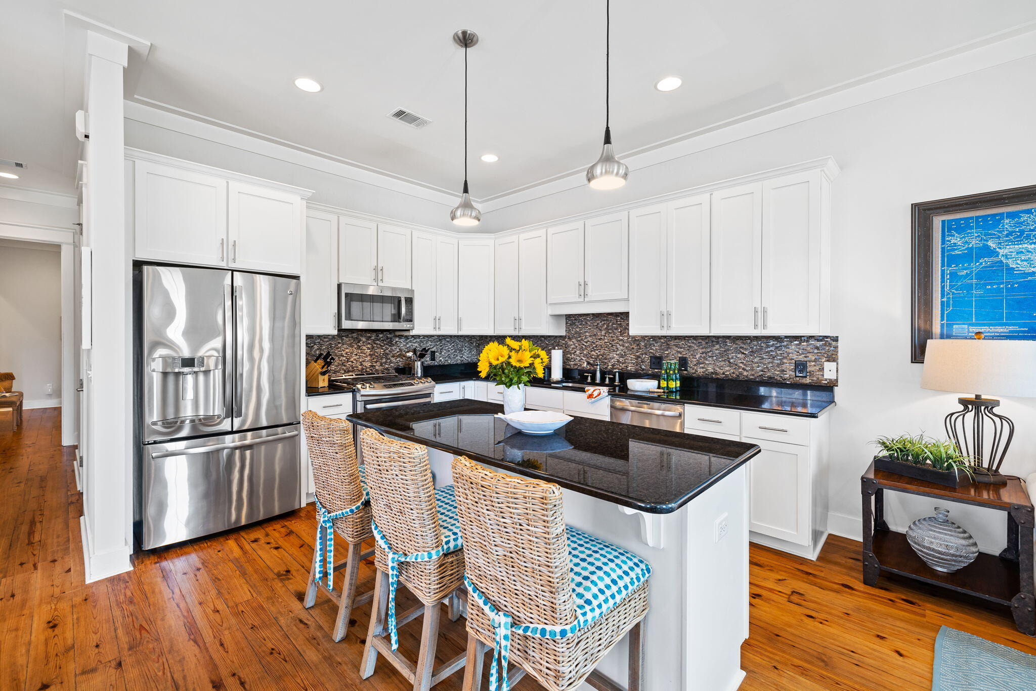 27 Matt's Way Santa Rosa Beach, FL 32459 - Photo 5 of 67 a kitchen with granite countertop a refrigerator a stove a sink and a center island
