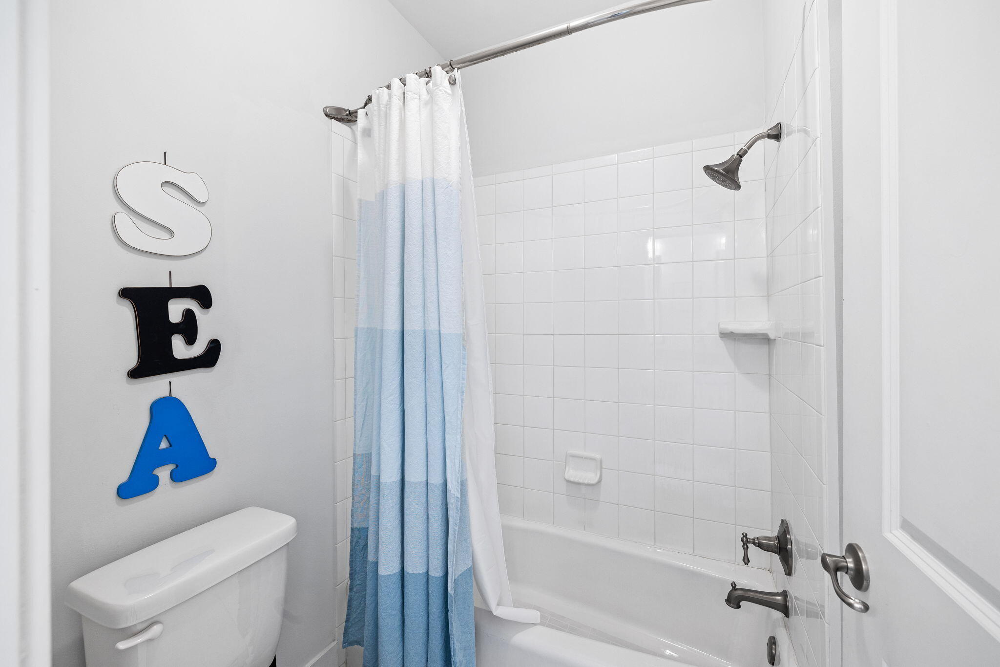 27 Matt's Way Santa Rosa Beach, FL 32459 - Photo 51 of 67 a bathroom with a shower a toilet and a sink