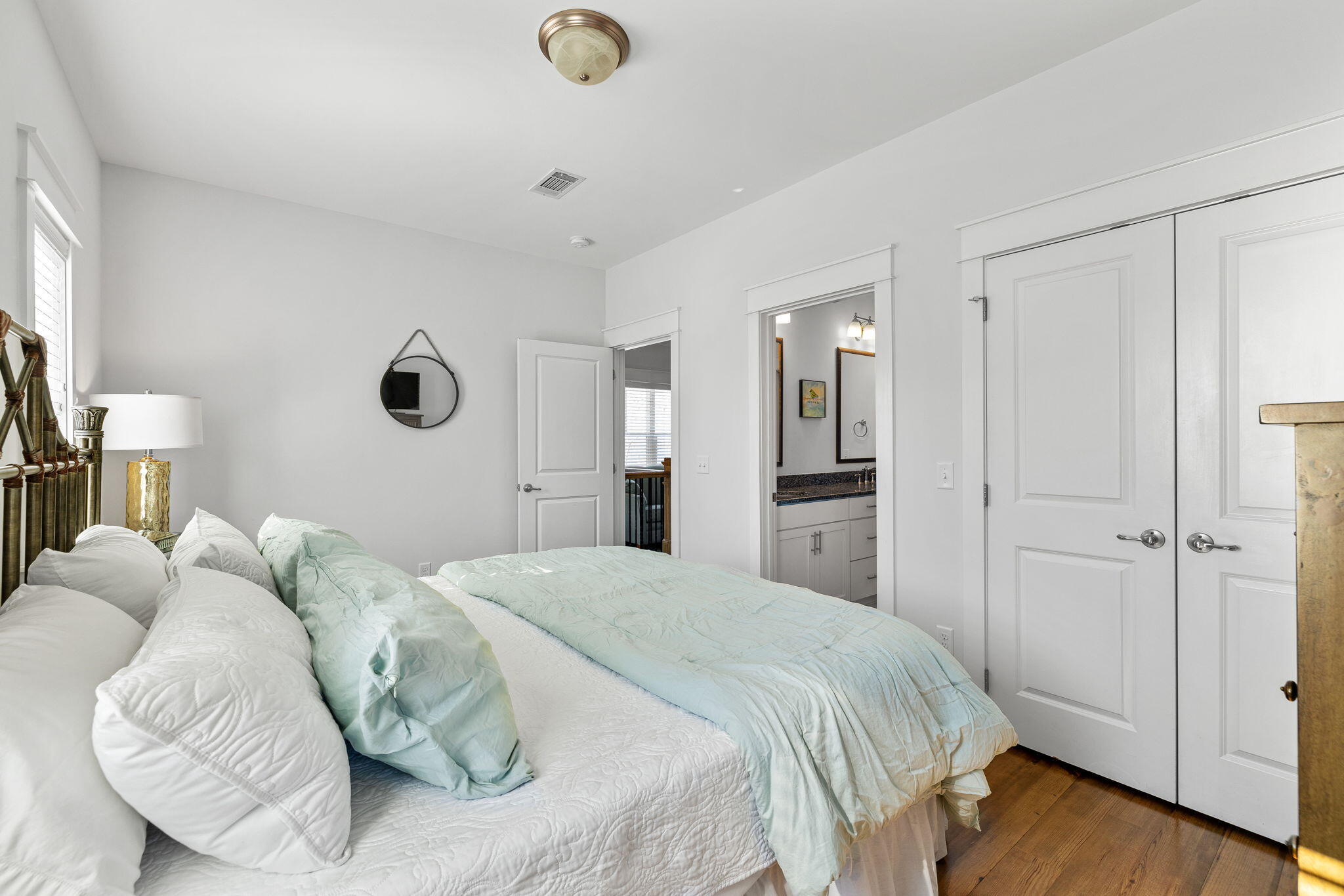 27 Matt's Way Santa Rosa Beach, FL 32459 - Photo 54 of 67 a spacious bedroom with a bed and a chandelier