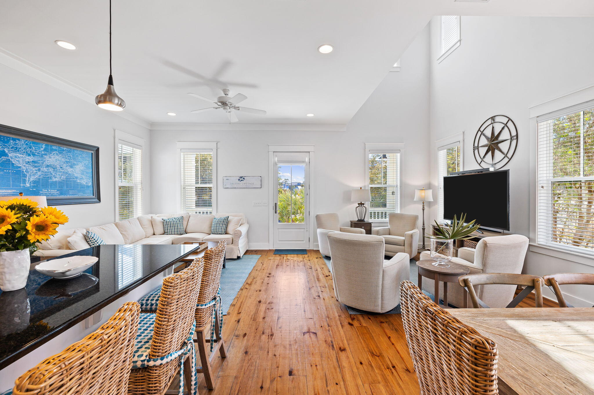27 Matt's Way Santa Rosa Beach, FL 32459 - Photo 9 of 67 a living room with furniture a flat screen tv and a large window