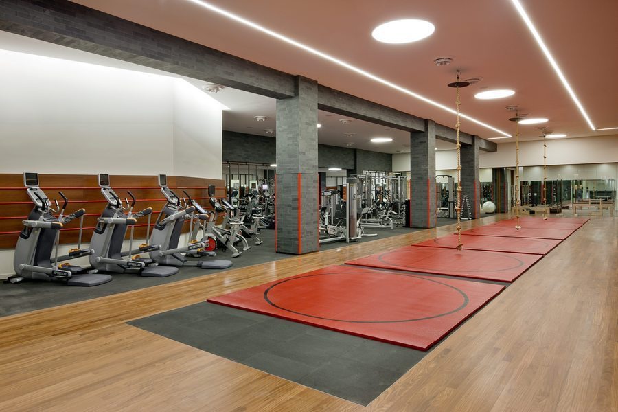 50 Riverside Boulevard, Unit 5B Manhattan, NY 10069 - Photo 11 of 26 a room with lots of gym equipment