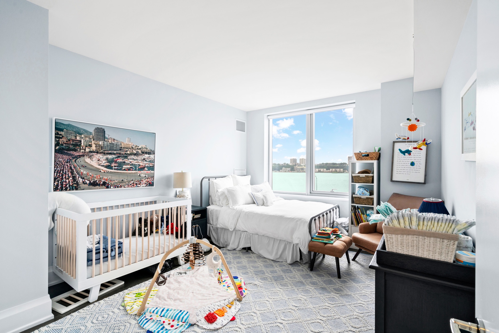 50 Riverside Boulevard, Unit 5B Manhattan, NY 10069 - Photo 7 of 26 a bedroom with furniture and a window