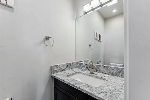 a bedroom with bed and window