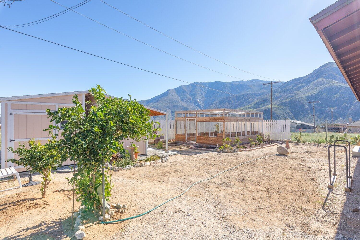 14290 Rafael Street Cabazon, CA 92230 - Photo 25 of 41 a view of a house with a snow in the background