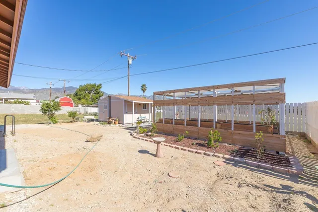 a view of a backyard of a house