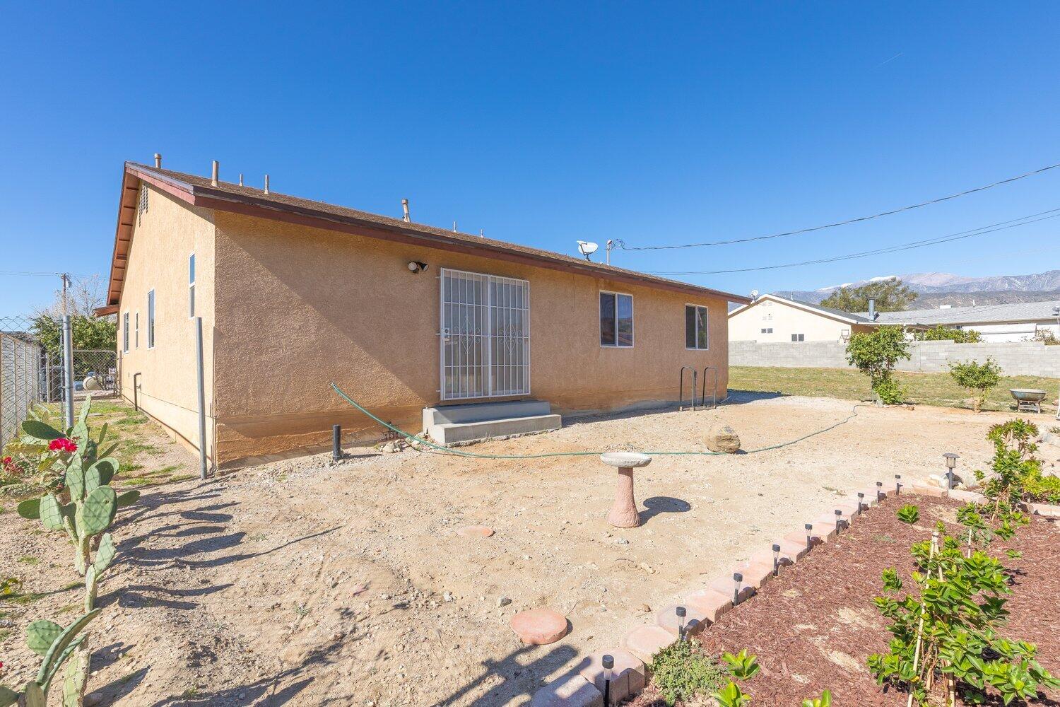 14290 Rafael Street Cabazon, CA 92230 - Photo 28 of 41 a view of a backyard of a house