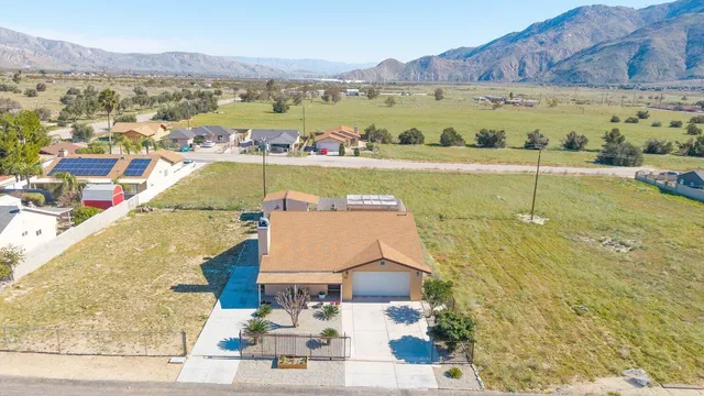 a view of a city with an ocean view