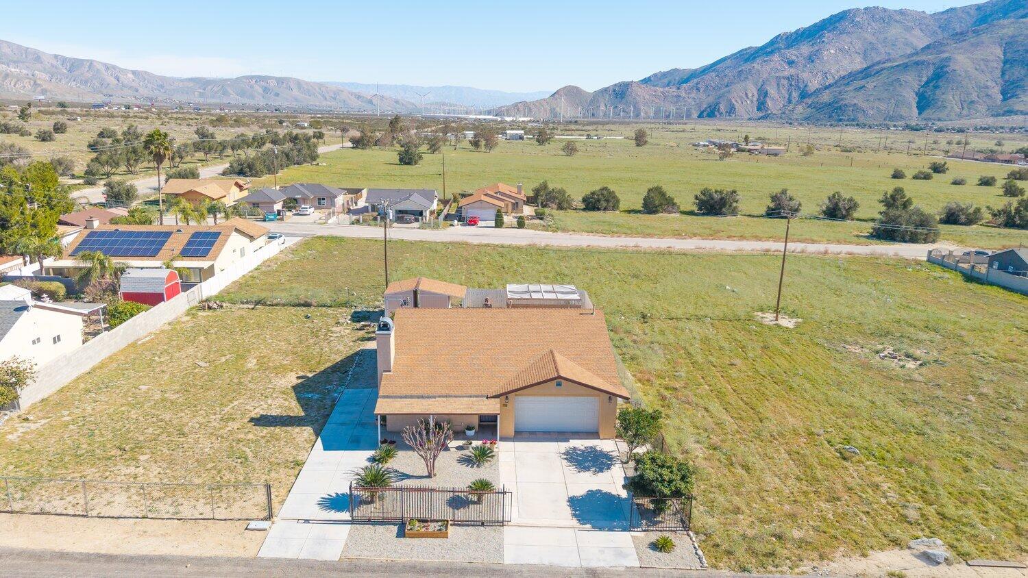 14290 Rafael Street Cabazon, CA 92230 - Photo 33 of 41 a view of a swimming pool with a lake view