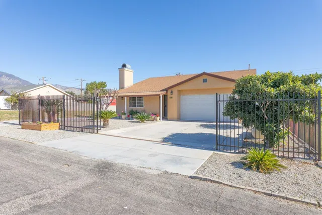 front view of a house with a street