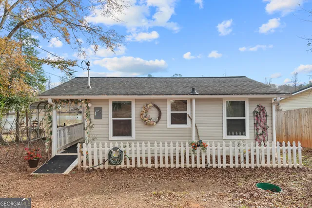 a front view of a house with a porch