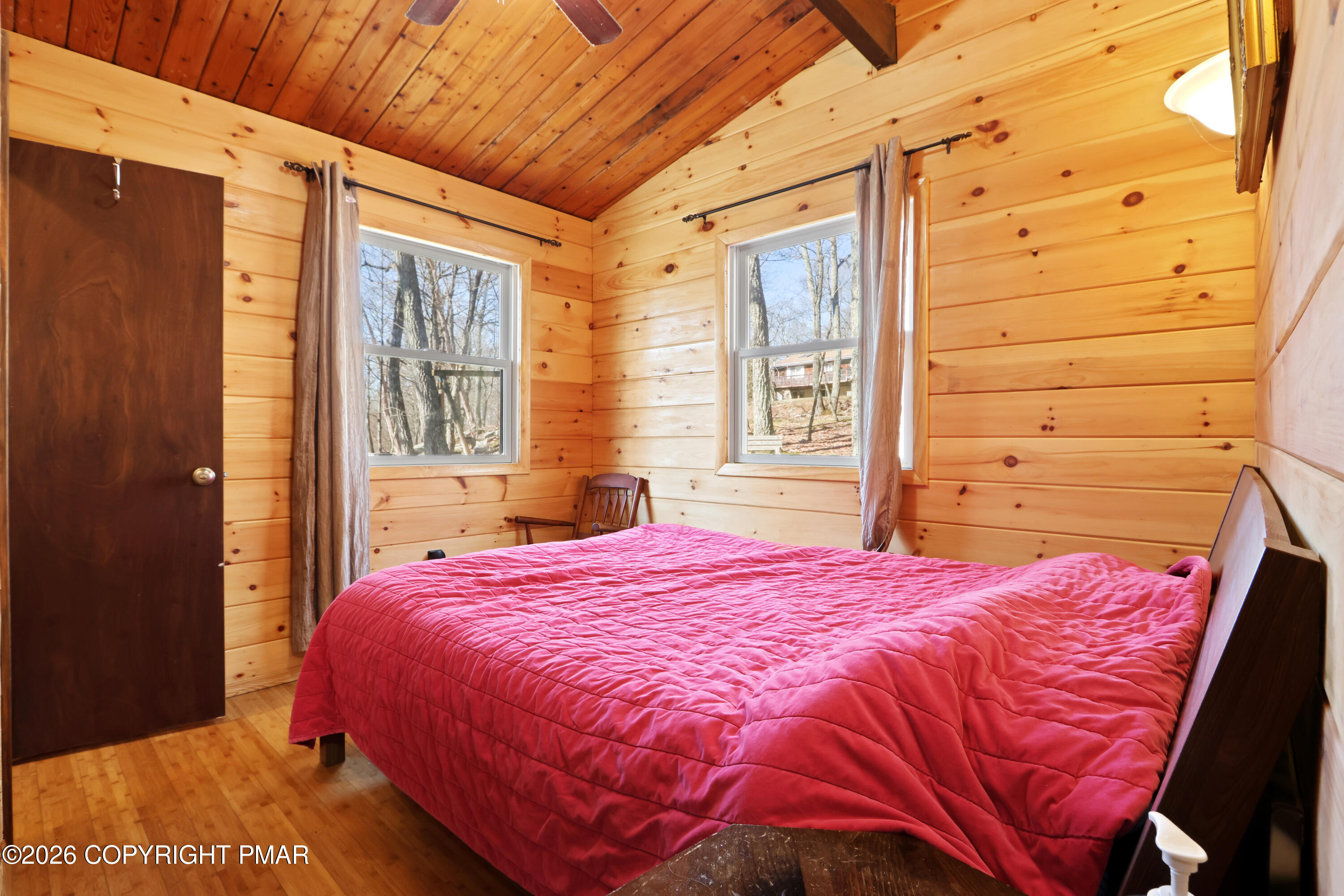 214 Mockingbird Trail Bushkill, PA 18324 - Photo 15 of 41 a bedroom with a bed and a window