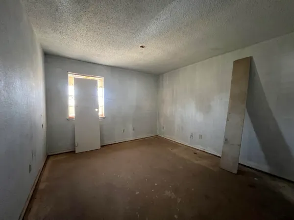 a view of a hallway with closet area