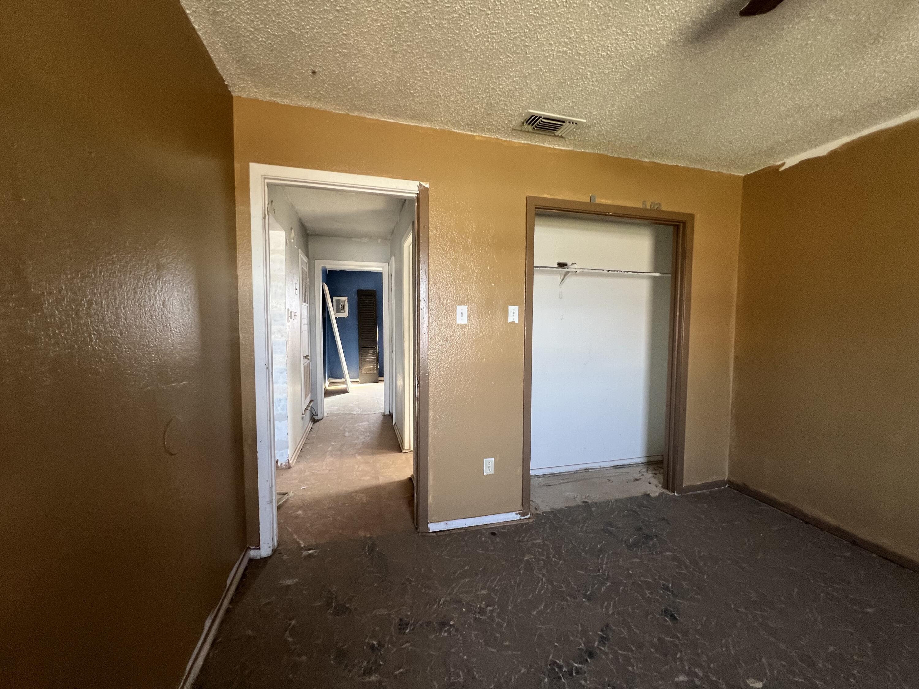 1309 32nd Street Lubbock, TX 79411 - Photo 18 of 28 an empty room with windows