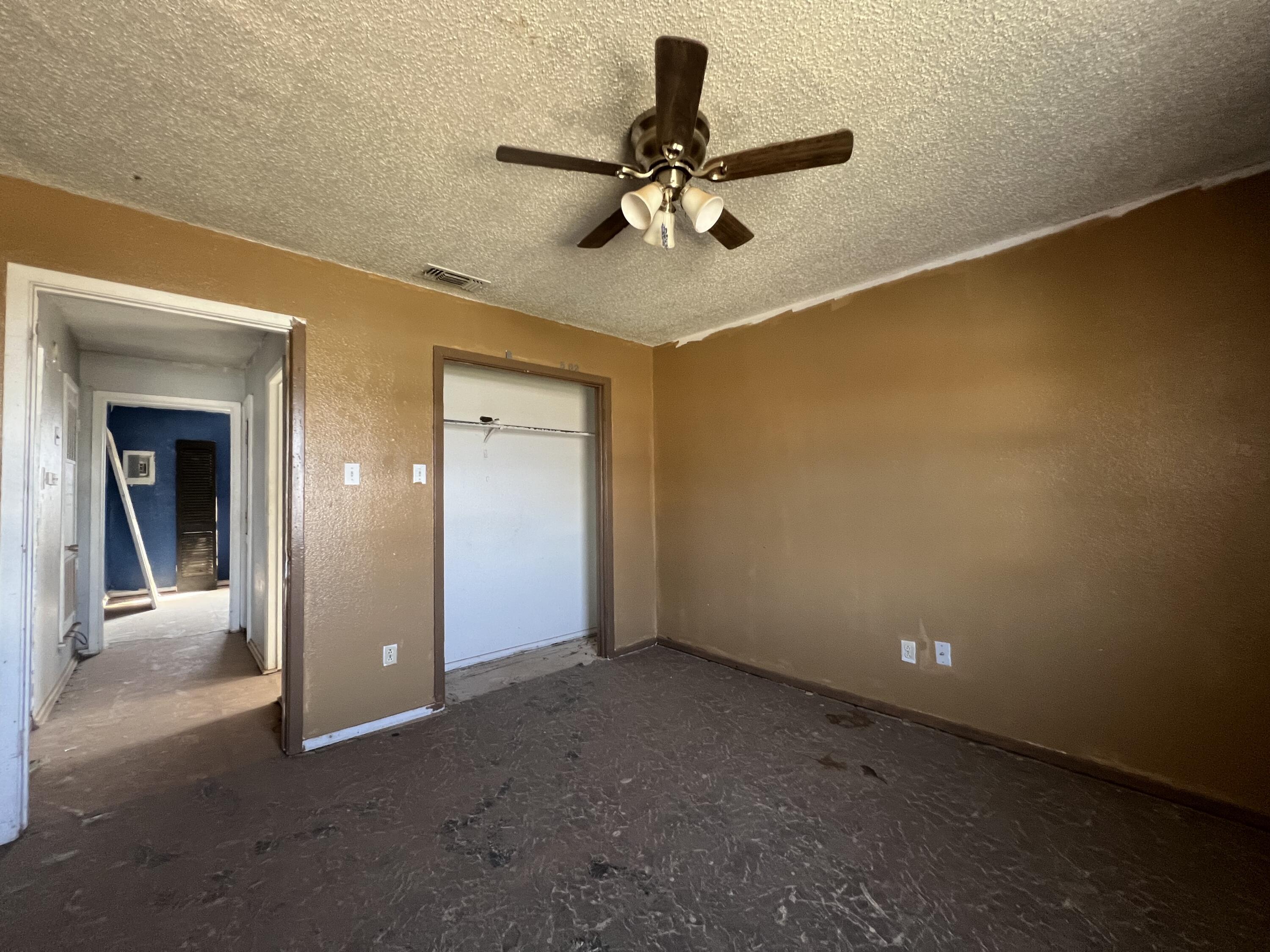 1309 32nd Street Lubbock, TX 79411 - Photo 19 of 28 wooden floor in an empty room and a window