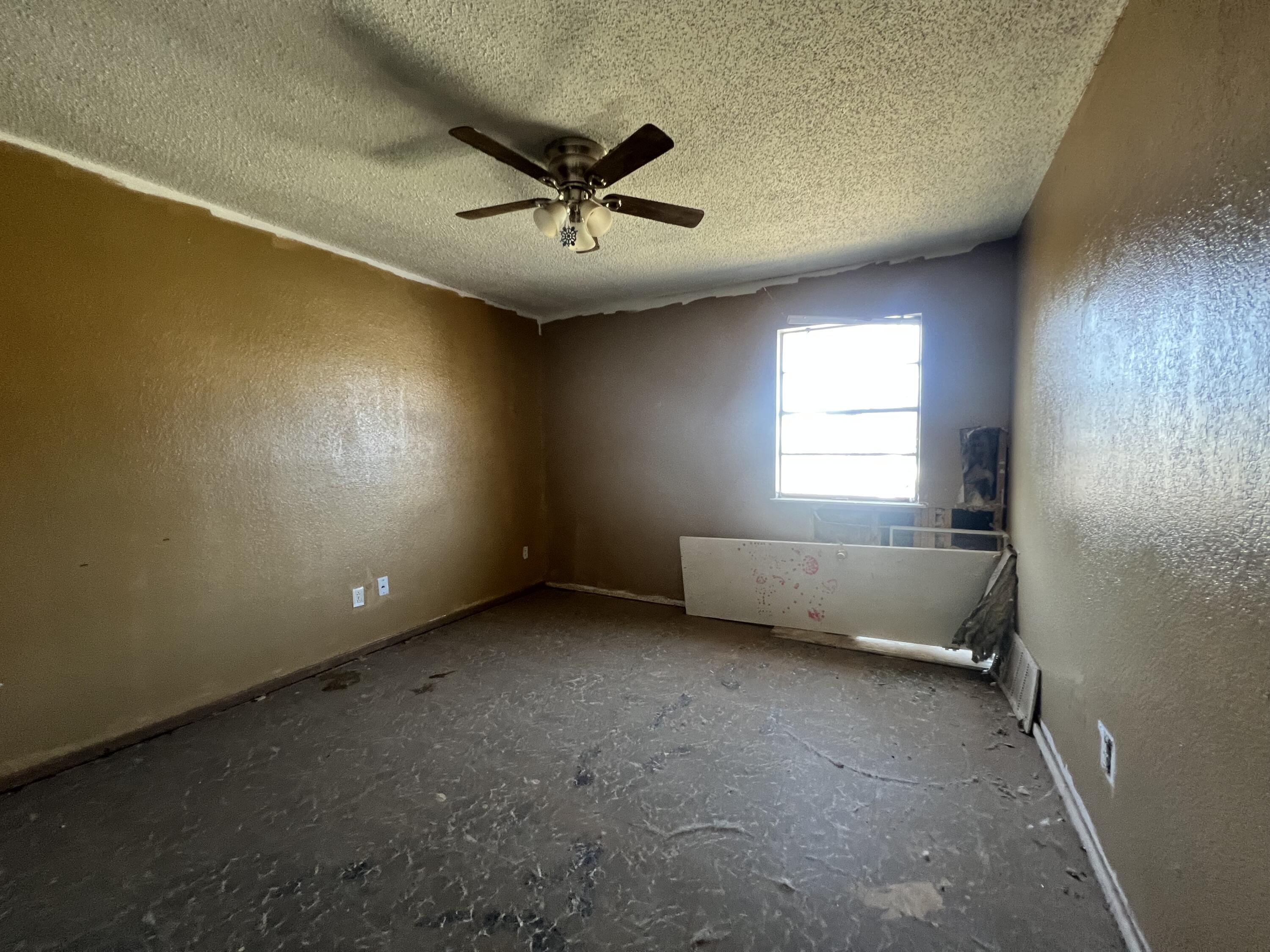 1309 32nd Street Lubbock, TX 79411 - Photo 20 of 28 a view of an empty room with a window