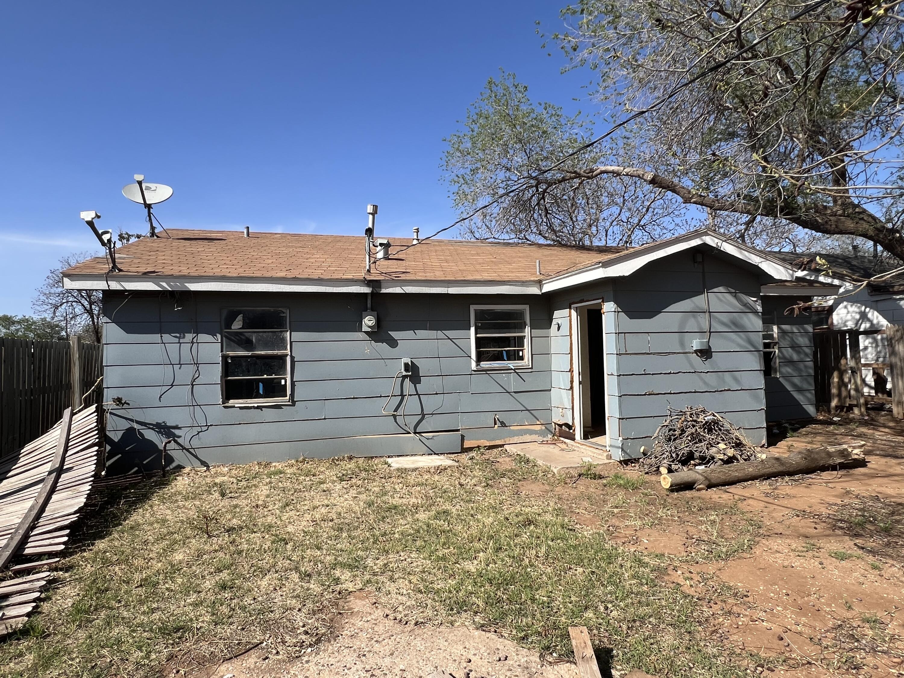 1309 32nd Street Lubbock, TX 79411 - Photo 28 of 28 a front view of a house with yard and seating space