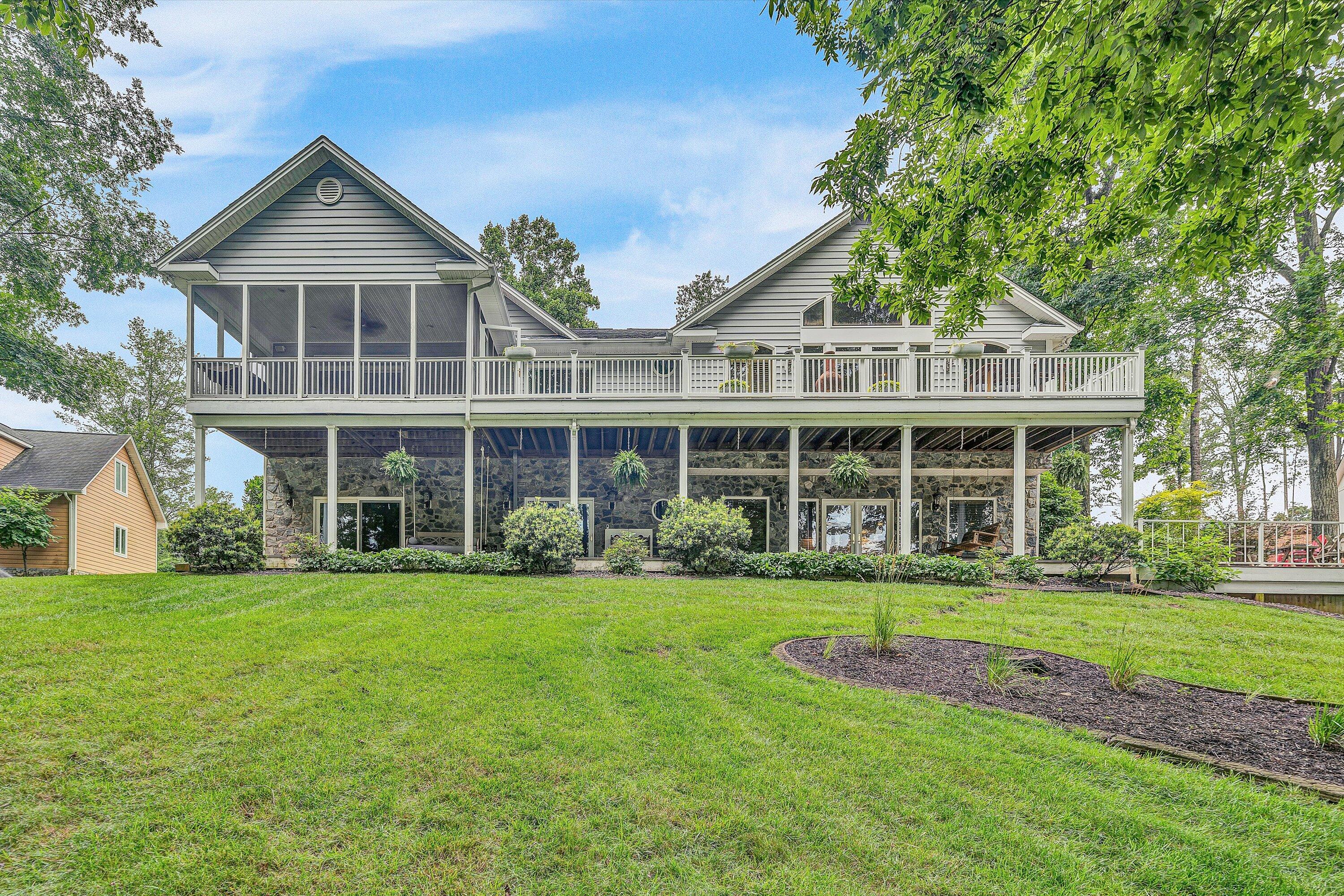 239 Cedar Bay Road Union Hall, VA 24176 - Photo 41 of 51 front view of a house with a yard