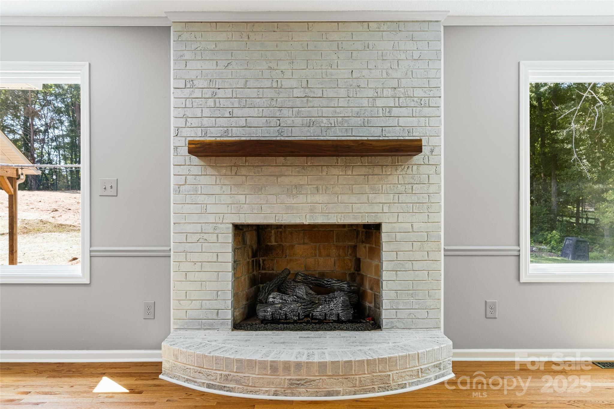 229 Campsite Road Rock Hill, SC 29732 - Photo 12 of 45 a living room with a fireplace and a window