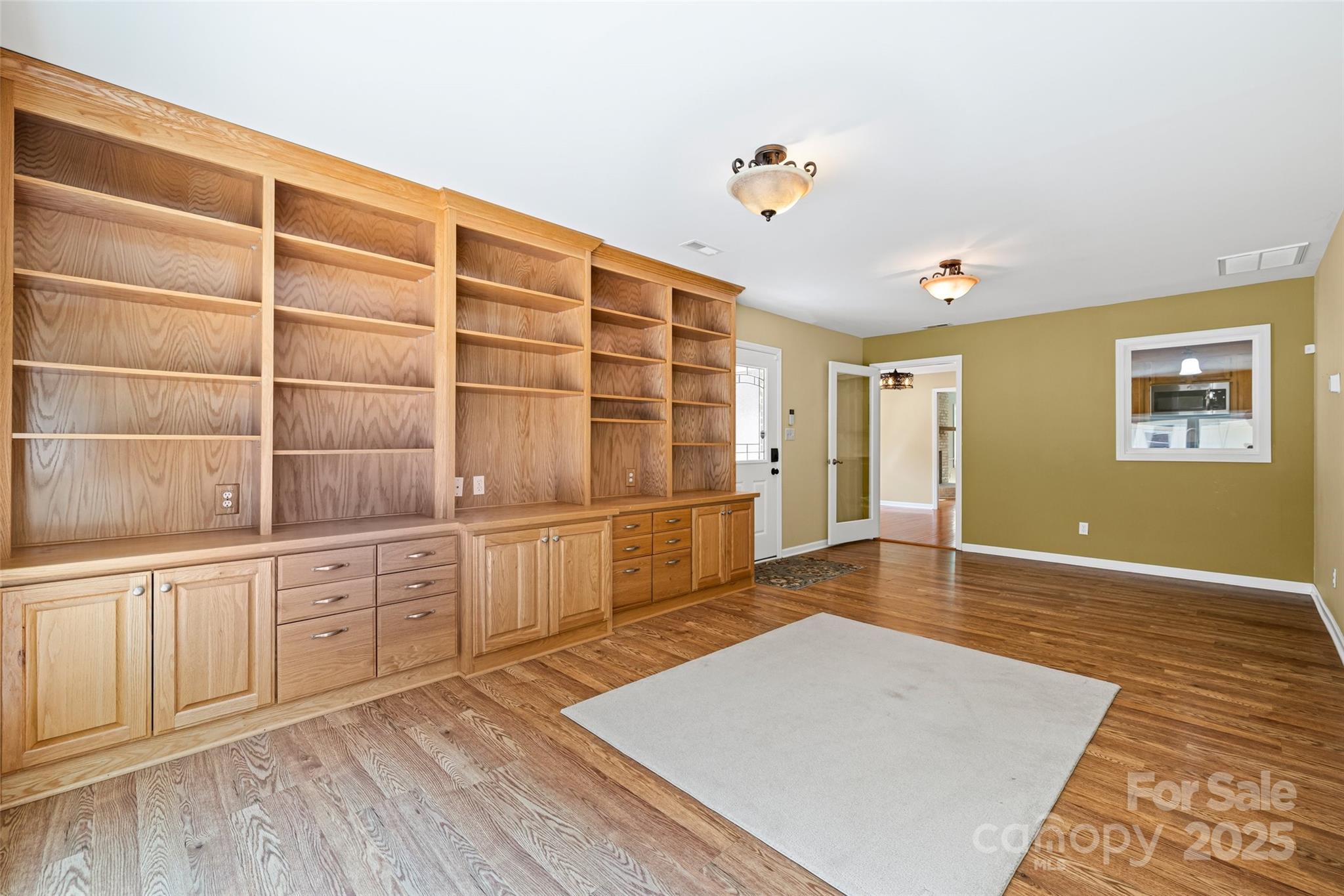 229 Campsite Road Rock Hill, SC 29732 - Photo 20 of 45 a view of an empty room with wooden floor and a window