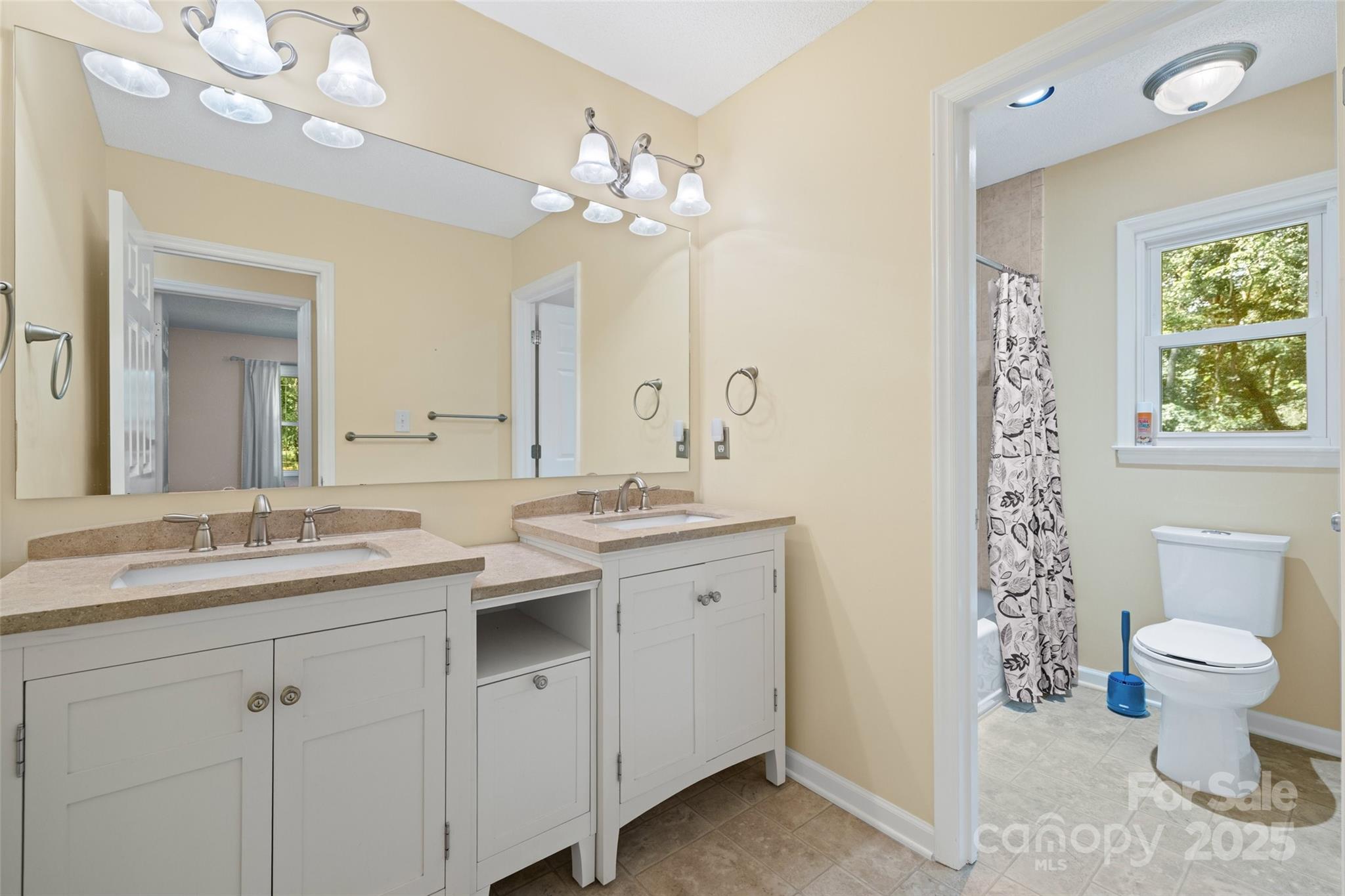 229 Campsite Road Rock Hill, SC 29732 - Photo 32 of 45 a spacious bathroom with a granite countertop sink a toilet and a mirror