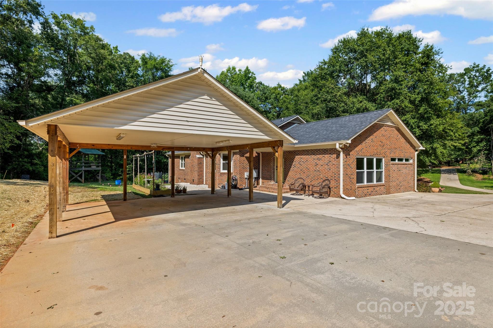 229 Campsite Road Rock Hill, SC 29732 - Photo 33 of 45 a front view of a house with porch and garden