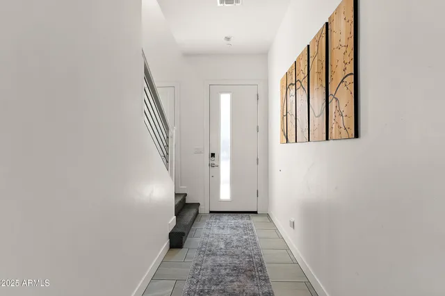 a view of a hallway with entryway